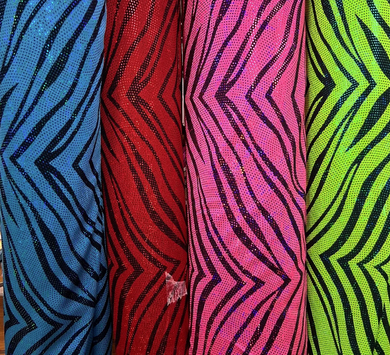 Four fabrics with zebra pattern in blue, red, pink, and green.[designerspandexandmore.com]